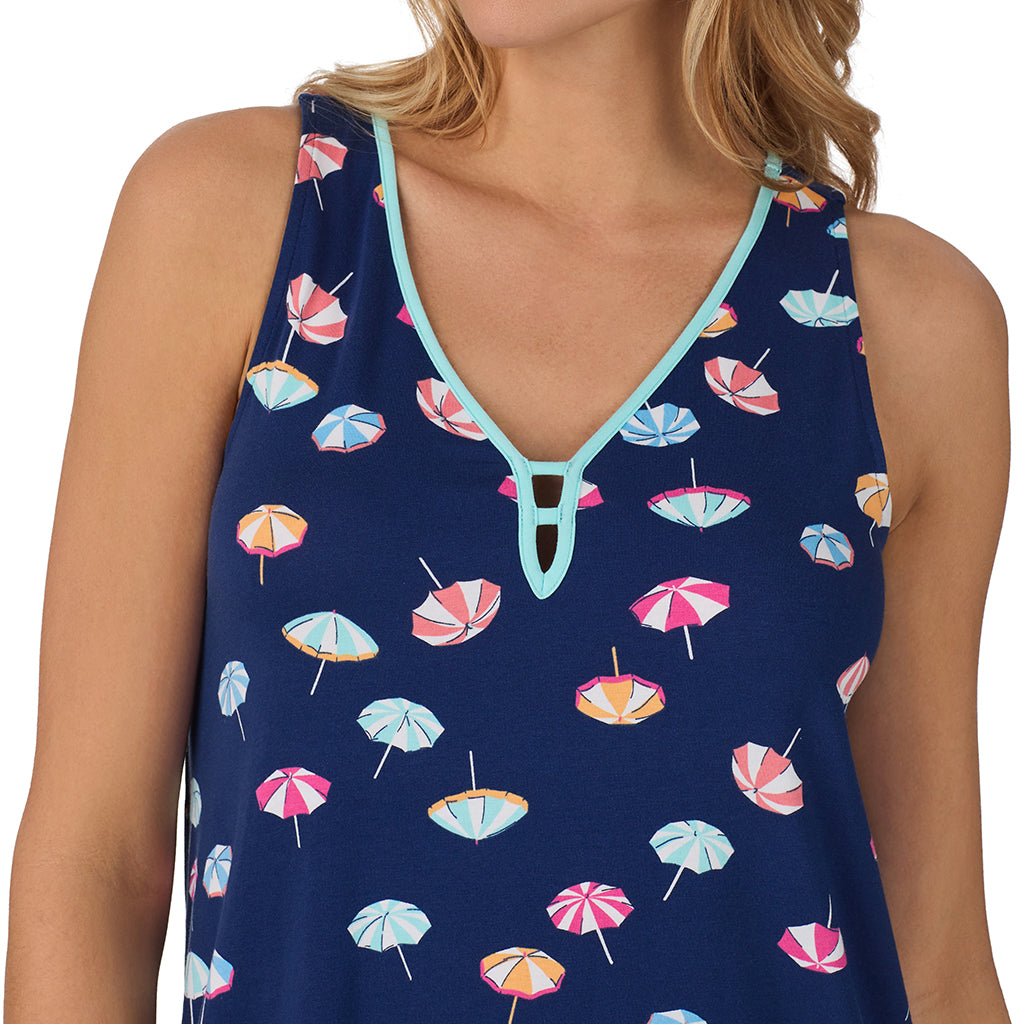Umbrella; Model is wearing size S. She is 5’10”, Bust 34”, Waist 26", Hips 38”.@ A lady wearing navy sleeveless cotton blend chemise with umbrella print.