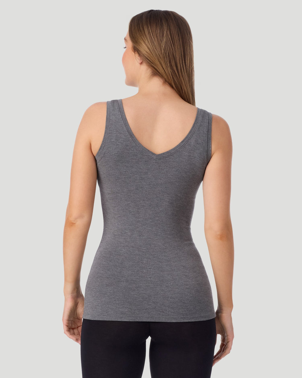 A lady wearing Softwear With Stretch Long Sleeve Bodysuit in charcoal heather shown in a front view standing pose