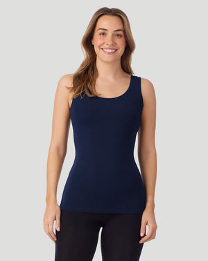 A lady wearing a black long sleeve stretch crew PETITE.