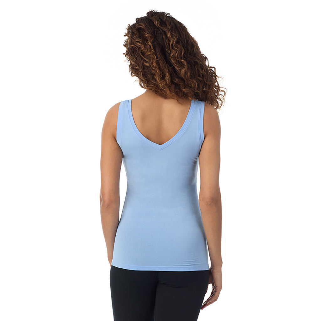 A lady wearing vista blue sleeveless reversible tank.