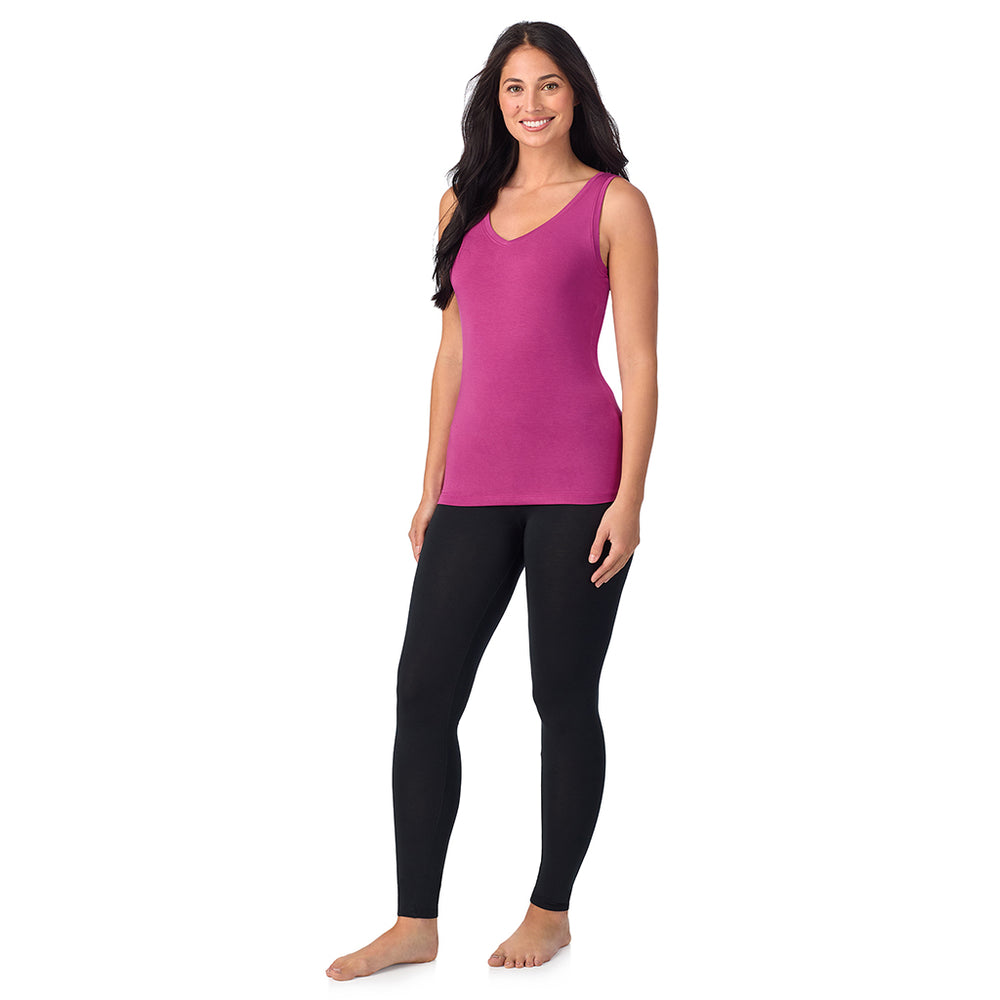 A lady wearing baton Rouge sleeveless reversible tank.
