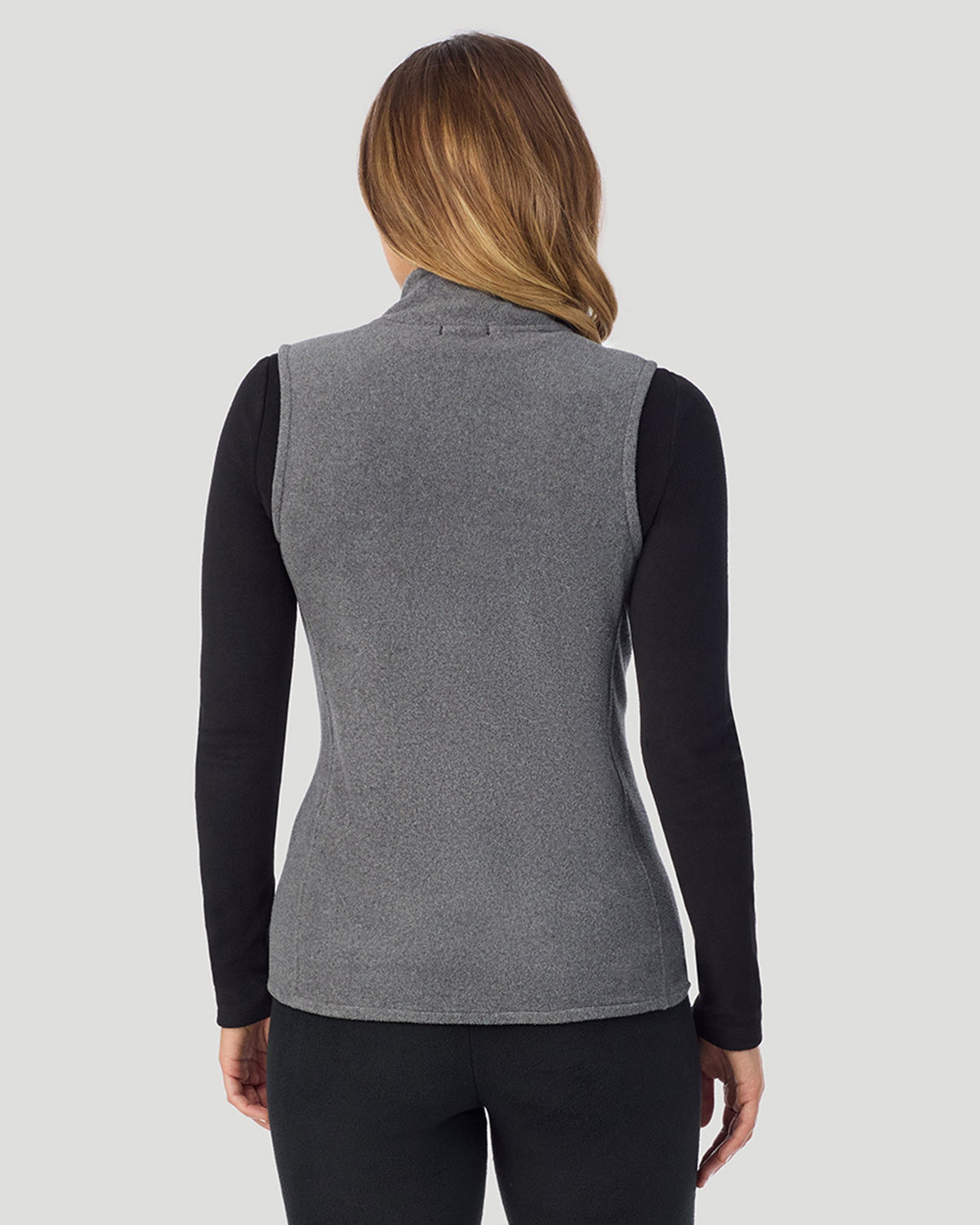 A lady wearing Fleecewear with Stretch Vest in Charcoal Heather back view back view