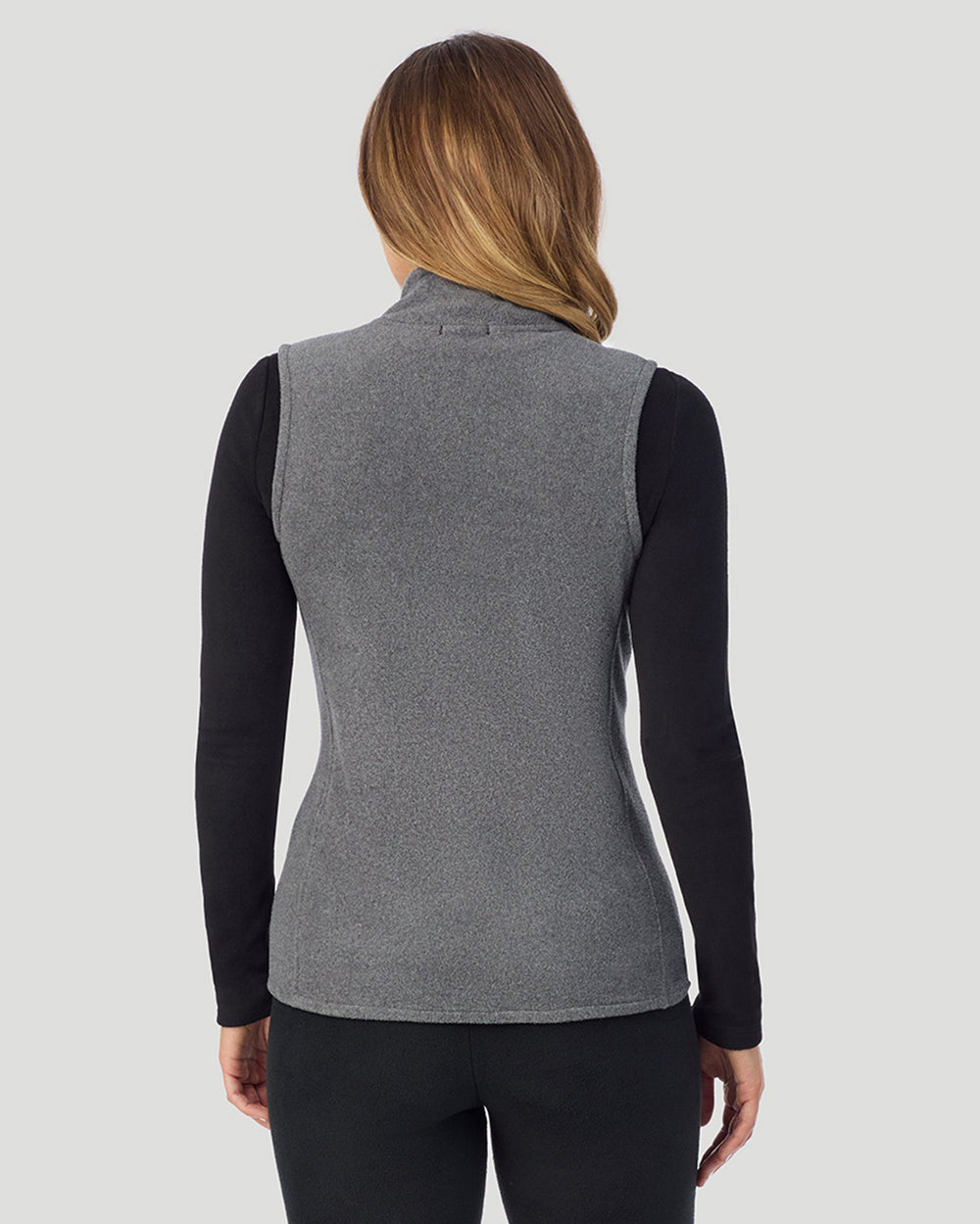 A lady wearing Fleecewear with Stretch Vest in Charcoal Heather back view back view