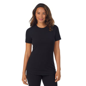 A lady wearing black cottonwear short sleeve t-shirt