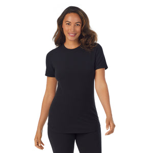 A lady wearing black cottonwear short sleeve t-shirt