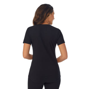 A lady wearing black cottonwear short sleeve t-shirt