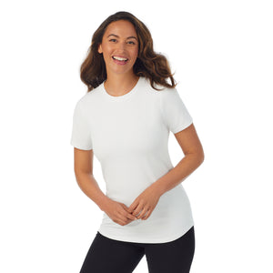 A lady wearing white cottonwear short sleeve t-shirt