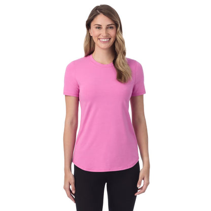 Fiji Pink; Model is wearing a size S. She is 5’9”, Bust 34”, Waist 25”, Hips 36”@A lady wearing Fiji Pink cottonwear short sleeve t-shirt