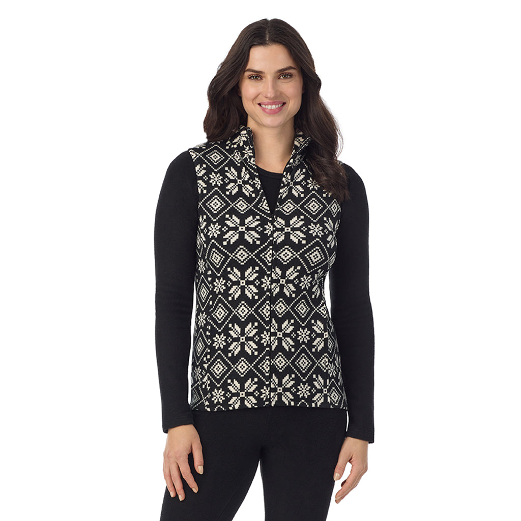  A Lady is wearing a Black White Snowflake Fleecewear With Stretch Full Zip Vest !94% Recycled Polyester, 6% Spandex!