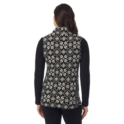 Black White Snowflake; Model is wearing a size S. She is 5’9”, Bust 34”, Waist 25”, Hips 36”@ A Lady is wearing a Black White Snowflake Fleecewear With Stretch Full Zip Vest !94% Recycled Polyester, 6% Spandex!