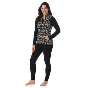  A Lady is wearing a Black White Snowflake Fleecewear With Stretch Full Zip Vest !94% Recycled Polyester, 6% Spandex!