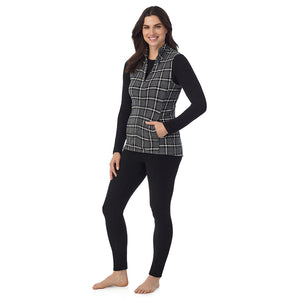  A Lady is wearing a Grey Black Plaid Fleecewear With Stretch Full Zip Vest !94% Recycled Polyester, 6% Spandex!