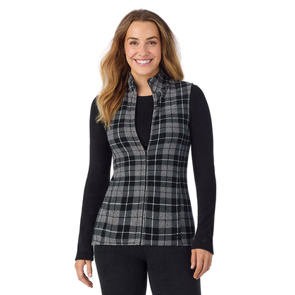 Charcoal Heather Tartan; Model is wearing size S. She is 5'11.5", Bust 34", Waist 26", Hips 37".@ A Lady is wearing a Charcoal Heather Tartan Fleecewear With Stretch Full Zip Vest !94% Recycled Polyester, 6% Spandex!