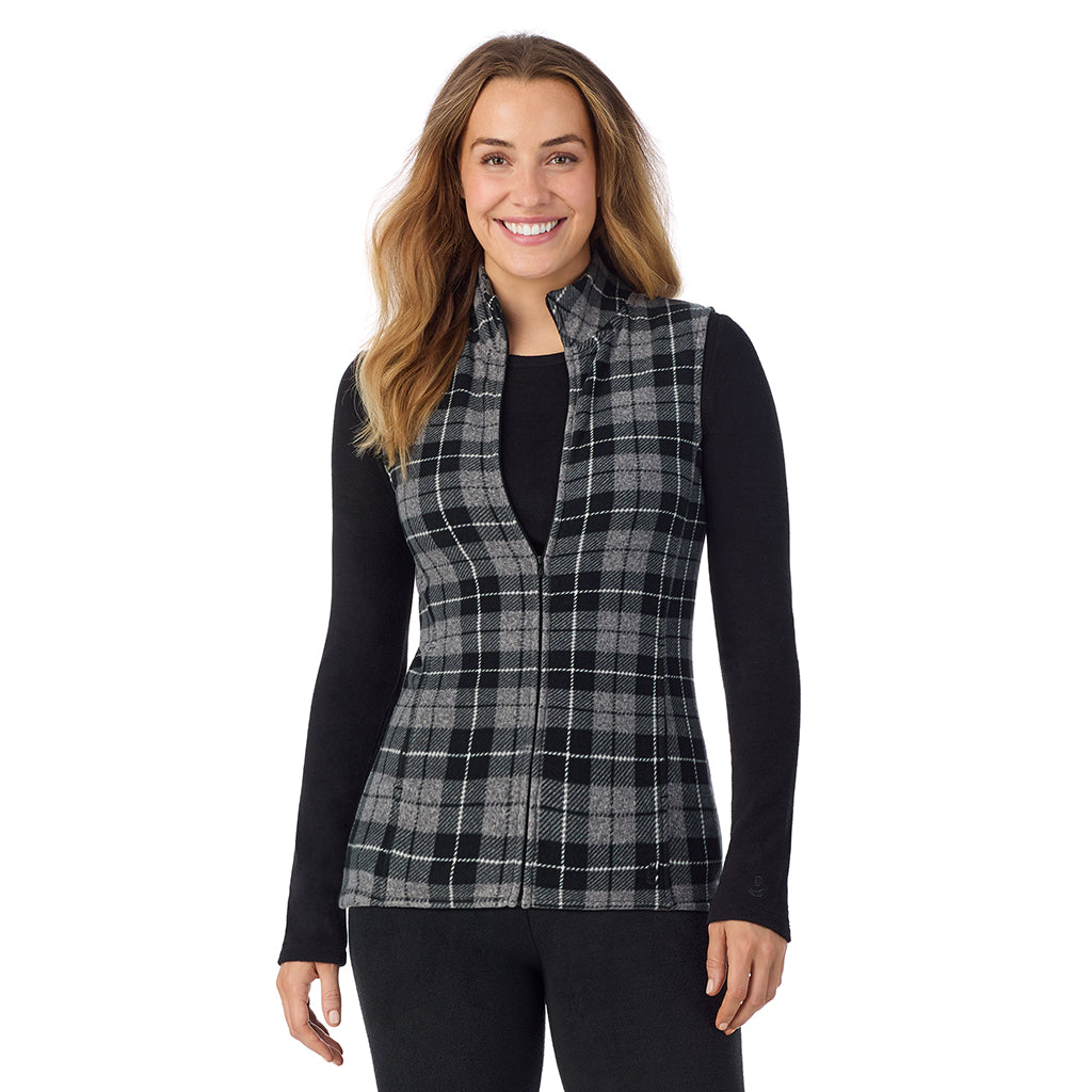  A Lady is wearing a Charcoal Heather Tartan Fleecewear With Stretch Full Zip Vest !94% Recycled Polyester, 6% Spandex!