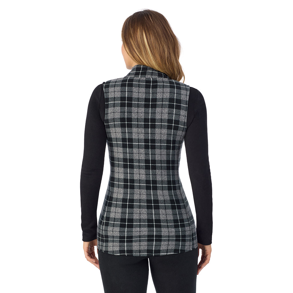  A Lady is wearing a Charcoal Heather Tartan Fleecewear With Stretch Full Zip Vest !94% Recycled Polyester, 6% Spandex!