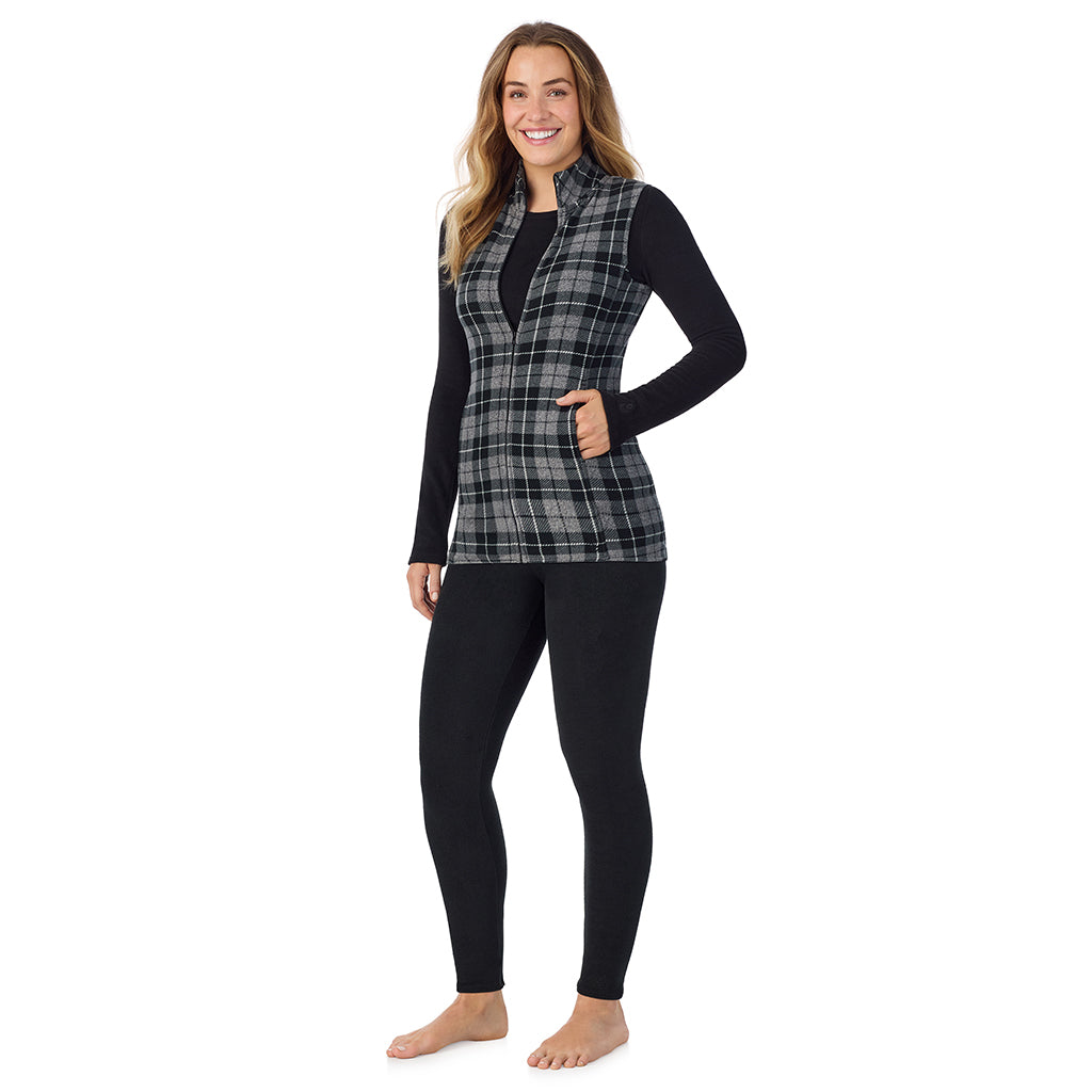  A Lady is wearing a Charcoal Heather Tartan Fleecewear With Stretch Full Zip Vest !94% Recycled Polyester, 6% Spandex!