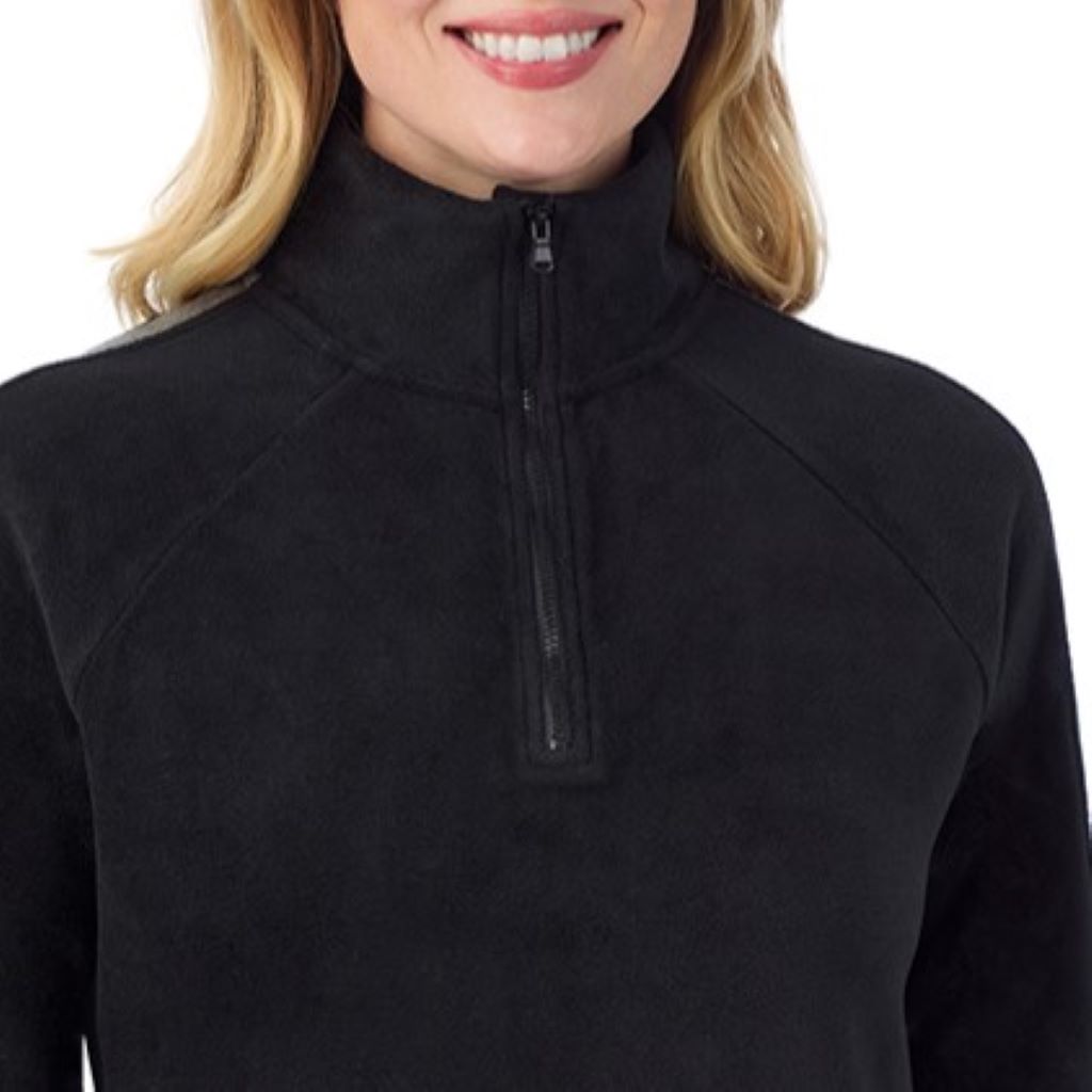 A lady wearing Black Cuddl Duds x Jennifer Lake Fleecewear with Stretch Half-Zip Pullover 