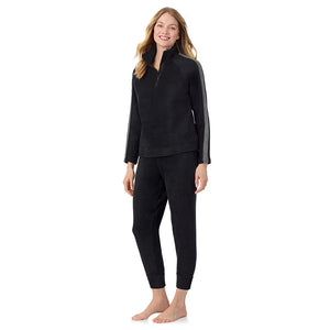 A lady wearing Black Cuddl Duds x Jennifer Lake Fleecewear with Stretch Half-Zip Pullover 
