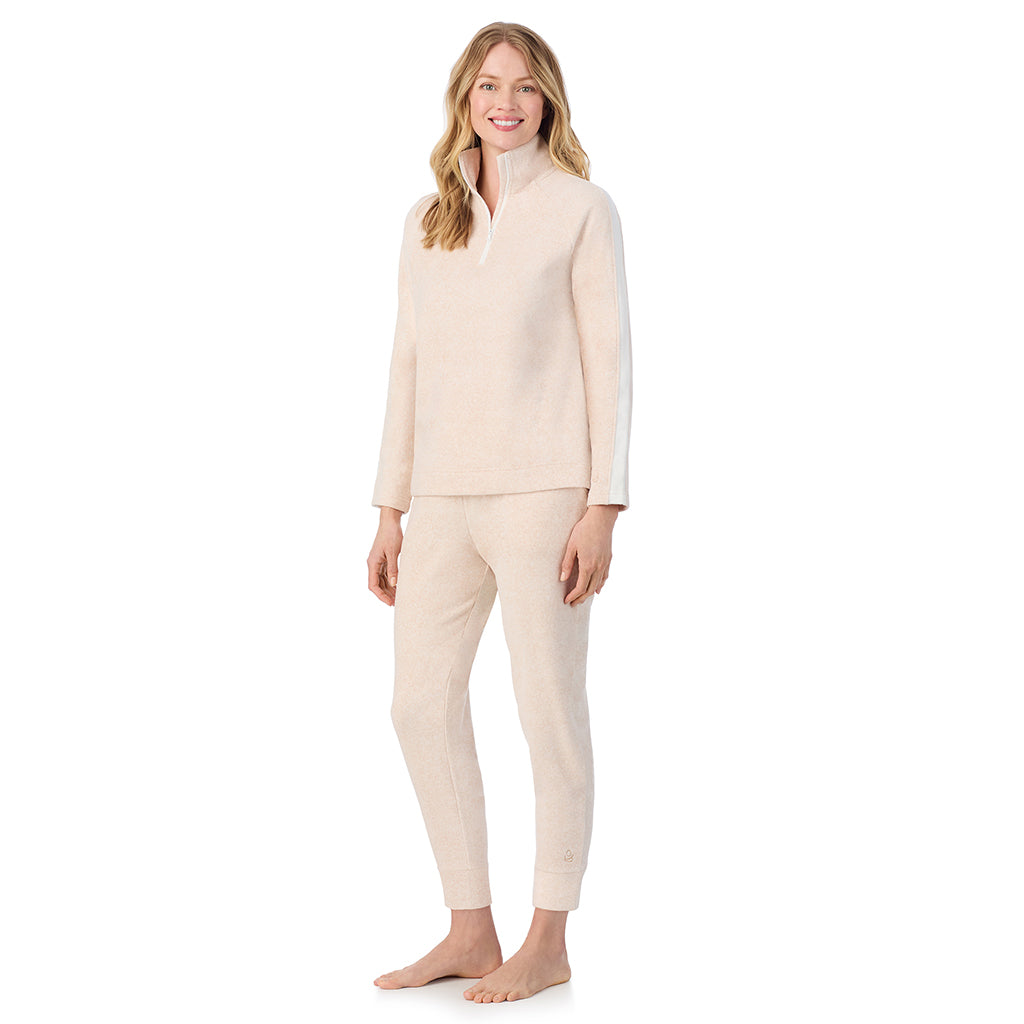 A lady wearing Oatmeal HeatherCuddl Duds x Jennifer Lake Fleecewear with Stretch Half-Zip Pullover 