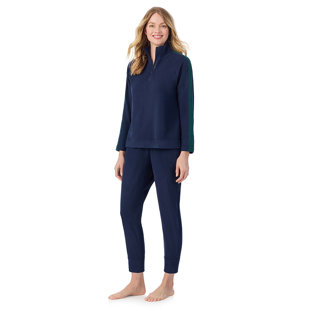 A lady wearing  Navy Blazer Cuddl Duds x Jennifer Lake Fleecewear with Stretch Half-Zip Pullover