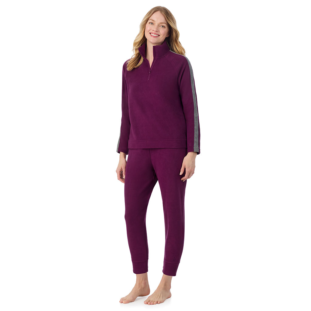 Dark Purple; Model is wearing size S. She is 5'11", Bust 33", Waist 24", Hips 34".@A lady wearing  Dark Purple Cuddl Duds x Jennifer Lake Fleecewear with Stretch Half-Zip Pullover 