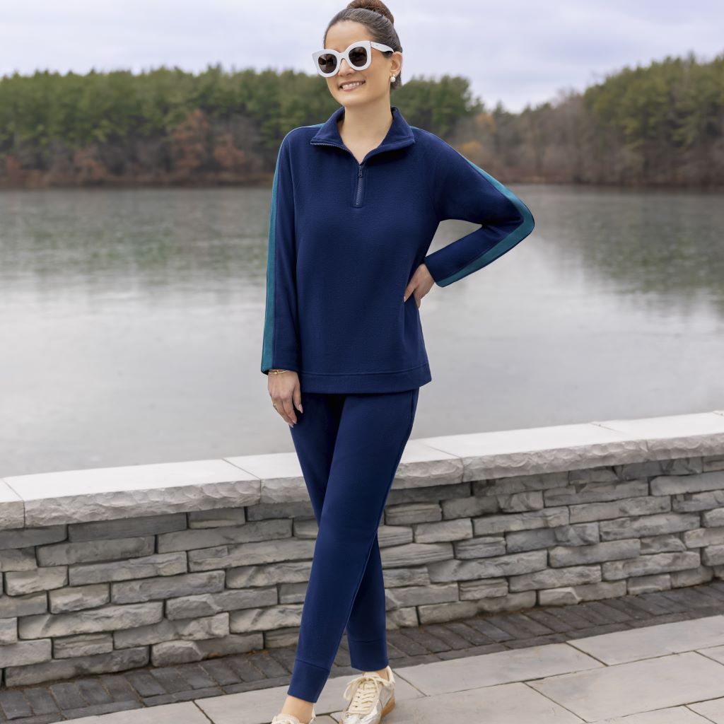 A lady wearing NAvy Blazer Cuddl Duds x Jennifer Lake Fleecewear with Stretch Half-Zip Pullover 
