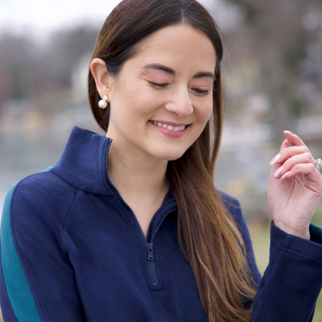 A lady wearing NAvy Blazer Cuddl Duds x Jennifer Lake Fleecewear with Stretch Half-Zip Pullover 
