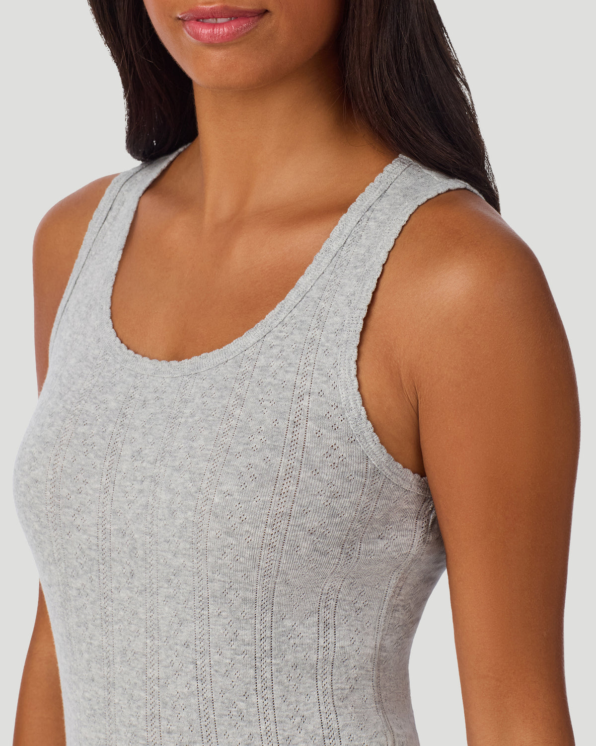  A lady wearing Grey Heather Cotton Pointelle Tank in a front view fabric detail close up look
