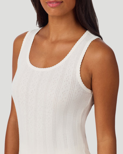  A lady wearing Ivory Cotton Pointelle Tank in a front view fabric detail close up look