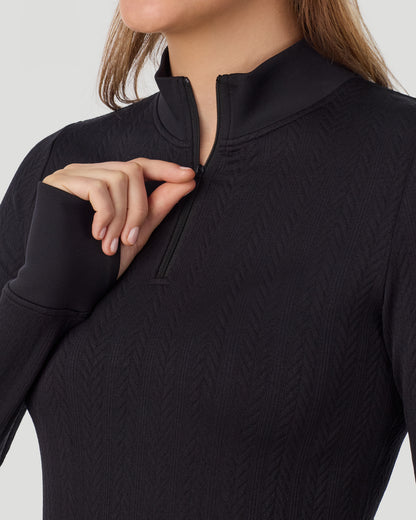  A lady wearing Cozy Cable Long Sleeve Quarter Zip Top in black closer at neck
