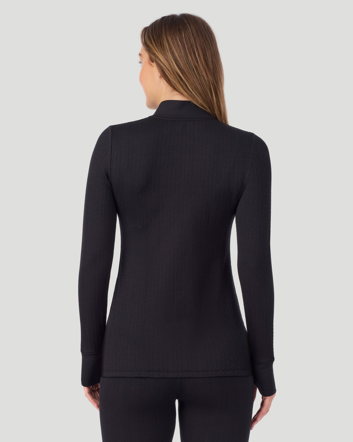  A lady wearing Cozy Cable Long Sleeve Quarter Zip Top in black back view