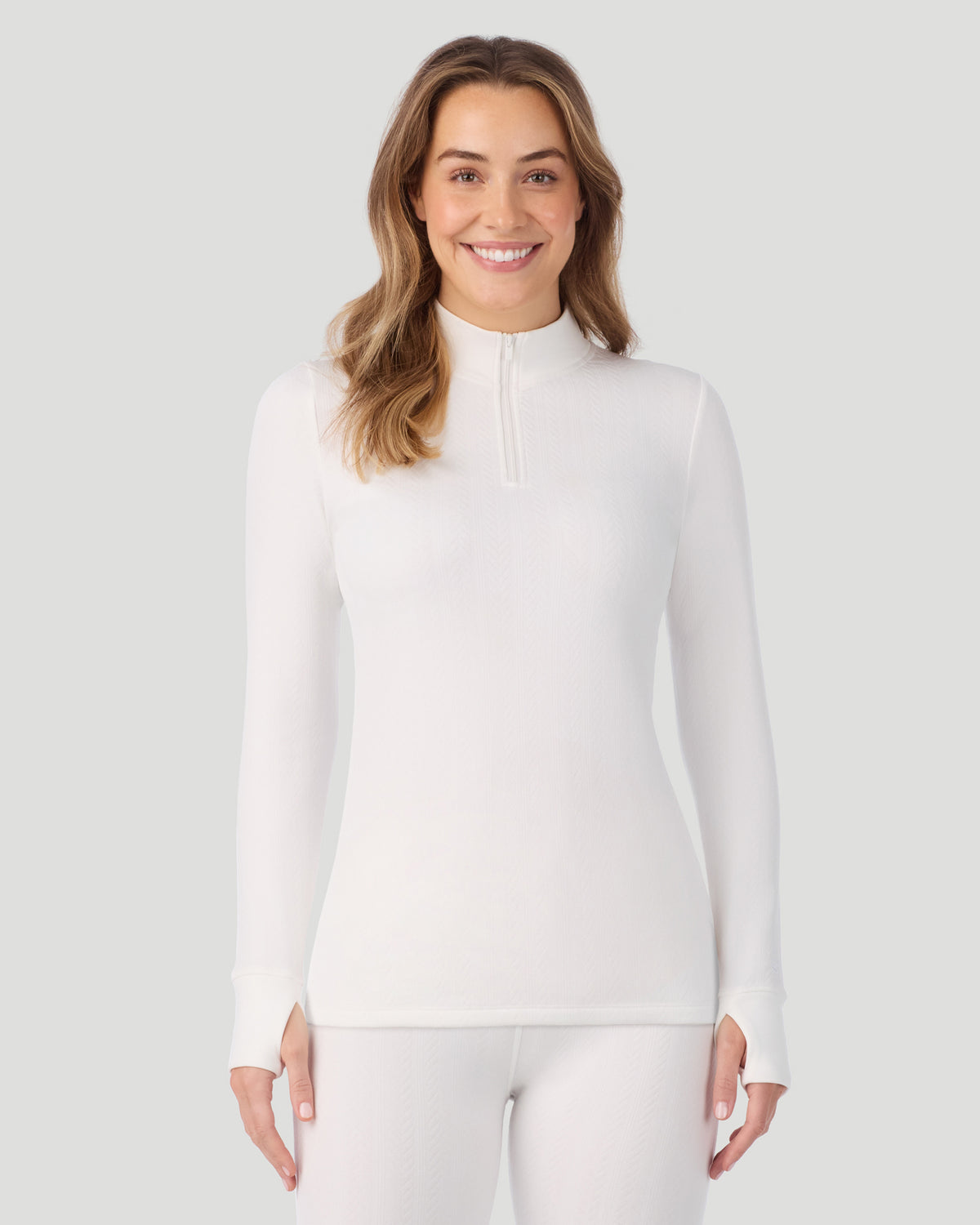 Ivory; Model is wearing a size S. She is 5’11.5”, Bust 34”, Waist 27”, Hips 38.5”. @ A lady wearing Cozy Cable Long Sleeve Quarter Zip Top in Ivory closer look