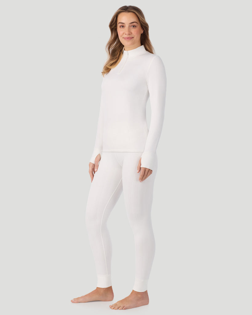  A lady wearing Cozy Cable Long Sleeve Quarter Zip Top in Ivory 