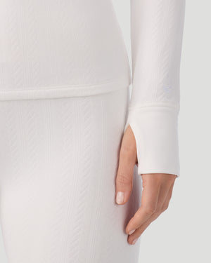  A lady wearing Cozy Cable Long Sleeve Quarter Zip Top in Ivory closer look at hand