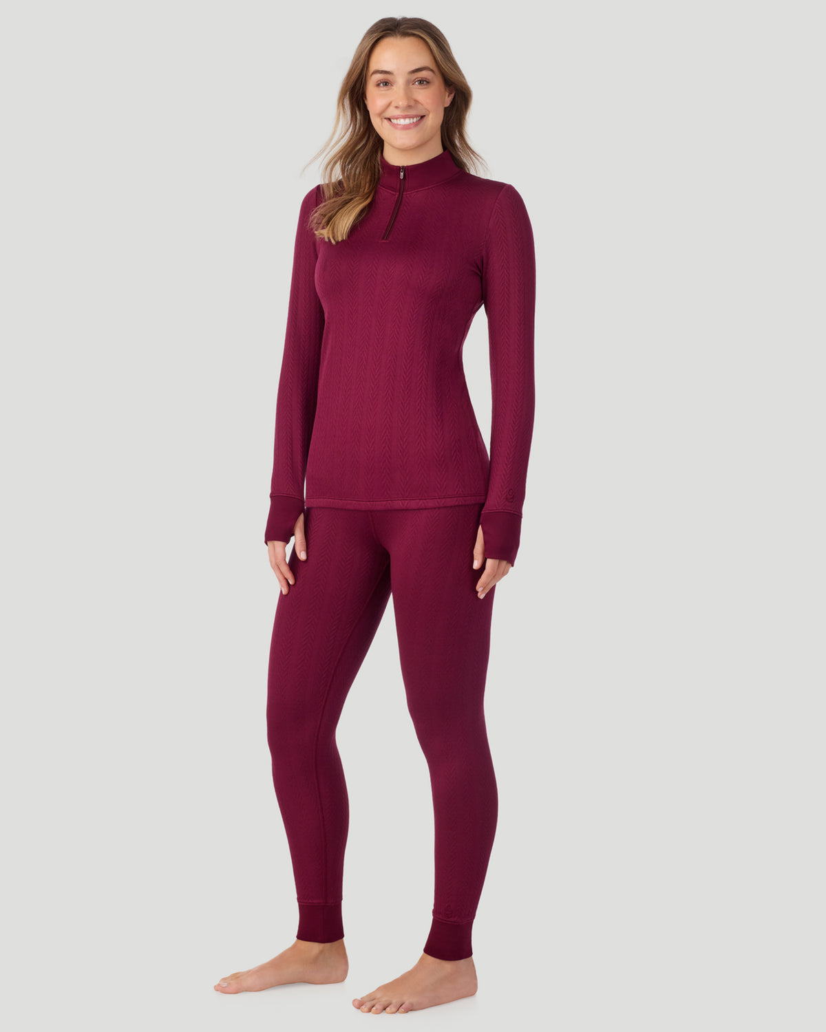  A lady wearing Cozy Cable Long Sleeve Quarter Zip Top in Bordeaux