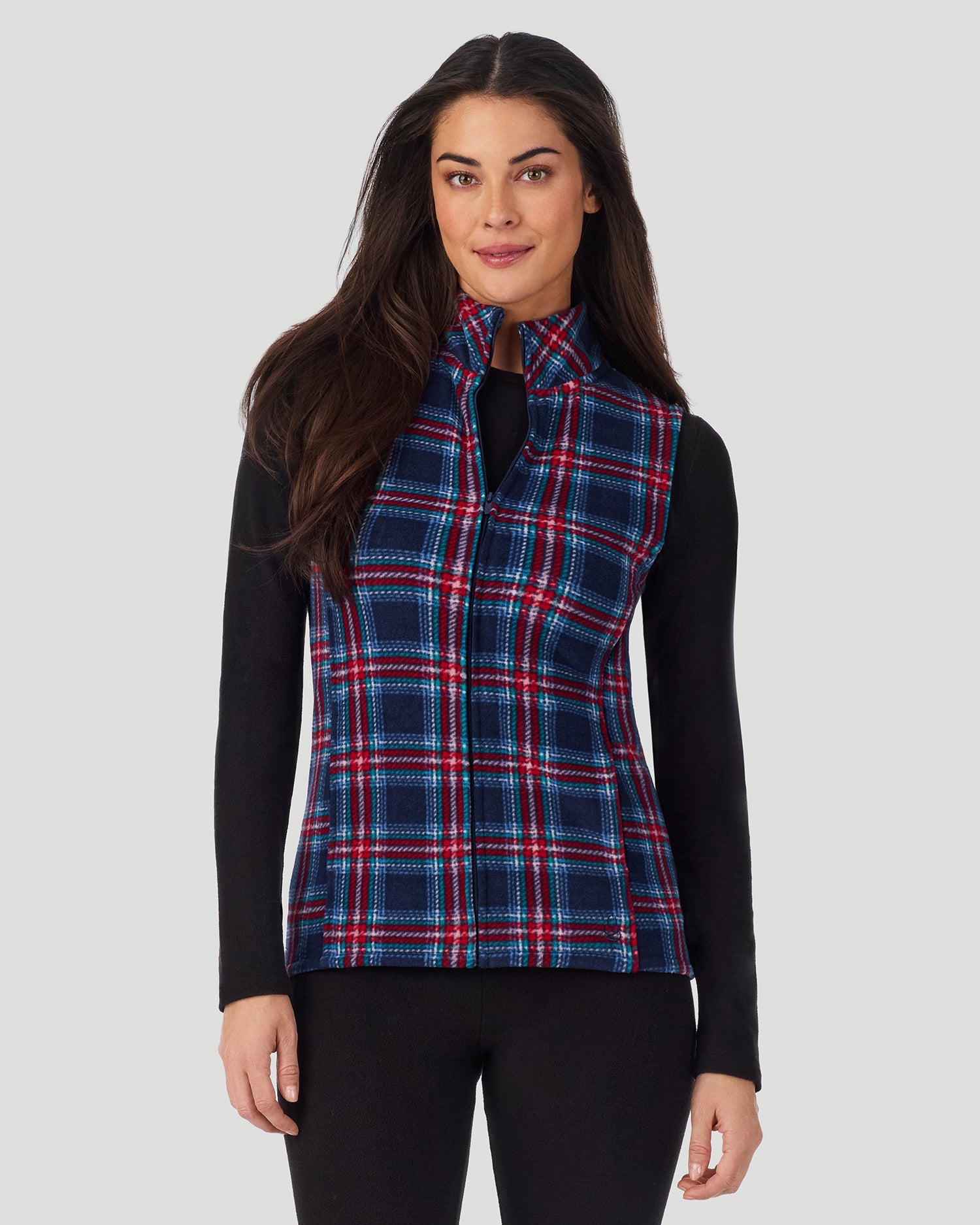 A lady wearing Fleecewear with Stretch Vest in Navy Tartan