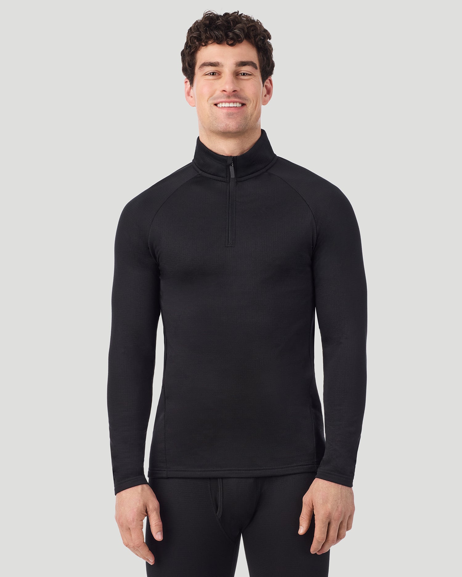Black; Model is wearing a size M. He is 6’2”, Waist is 32”, Inseam 32”. @ A man wearing Black X Fleece Quarter Zip in a front view pose