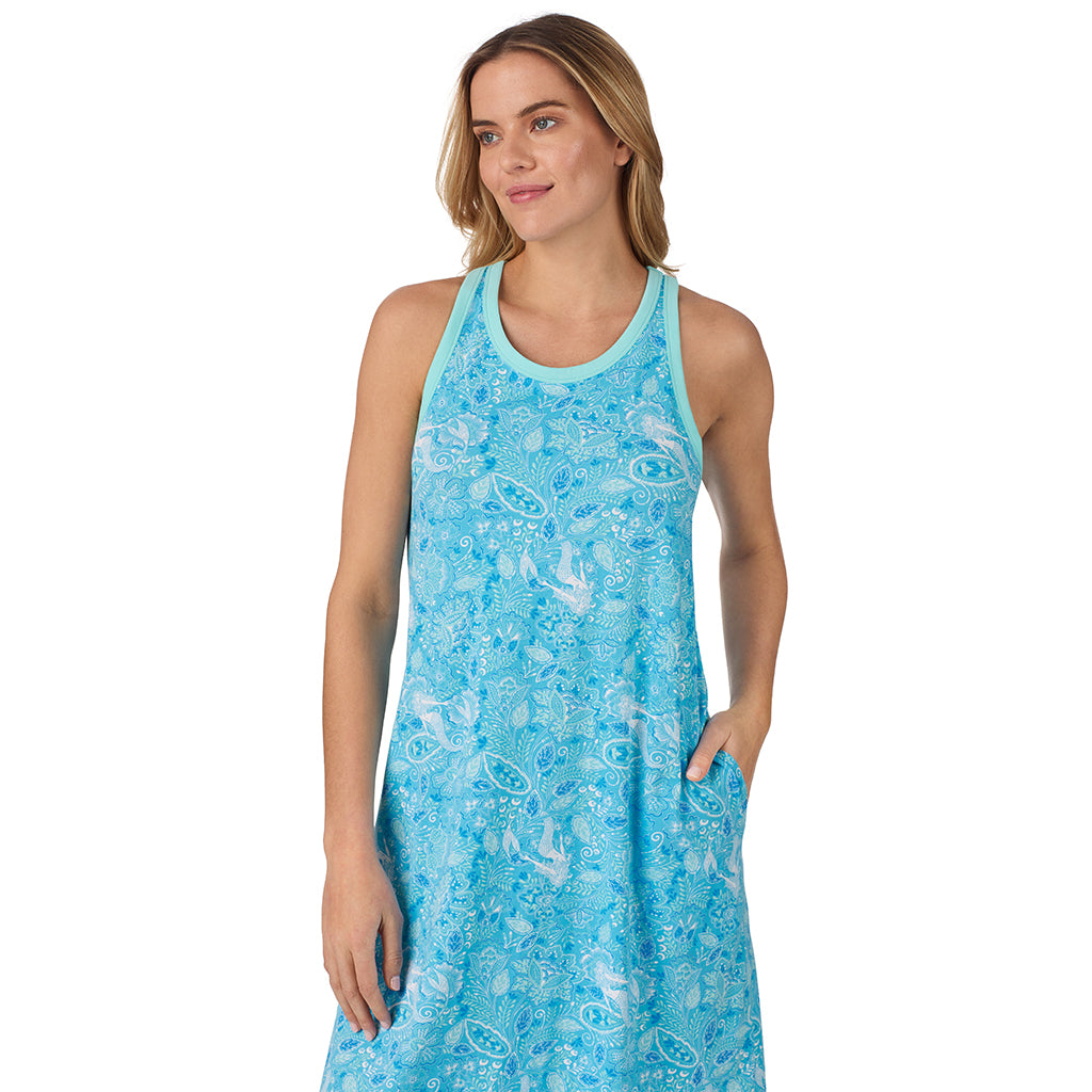 Mermaid Floral; Model is wearing size S. She is 5’10”, Bust 34”, Waist 26", Hips 38”.@A lady wearing blue sleeveless cotton blend sleep midi gown mermaid floral print.