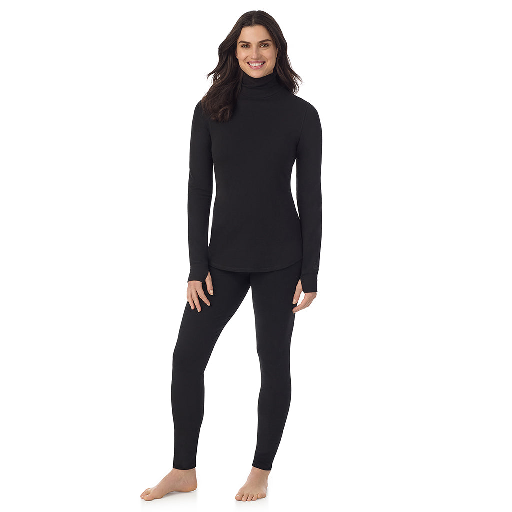 Black: Model is wearing a size S. She is 5’9”, Bust 34”, Waist 25”, Hips 36”@A lady wearing black Cottonwear Long Sleeve Turtleneck