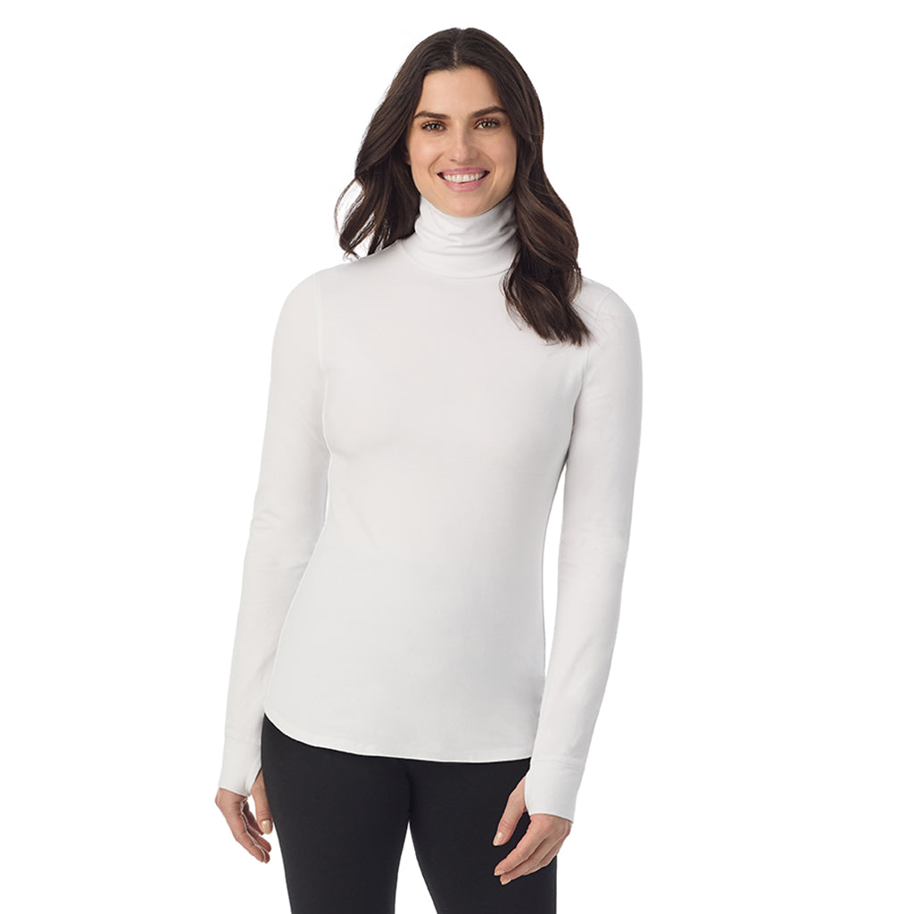 White: Model is wearing a size S. She is 5’9”, Bust 34”, Waist 25”, Hips 36”@A lady wearing White Cottonwear Long Sleeve Turtleneck