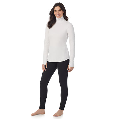 White: Model is wearing a size S. She is 5’9”, Bust 34”, Waist 25”, Hips 36”@A lady wearing White Cottonwear Long Sleeve Turtleneck