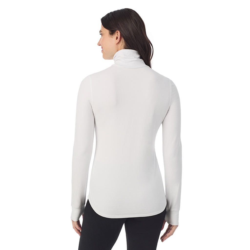 White: Model is wearing a size S. She is 5’9”, Bust 34”, Waist 25”, Hips 36”@A lady wearing White Cottonwear Long Sleeve Turtleneck