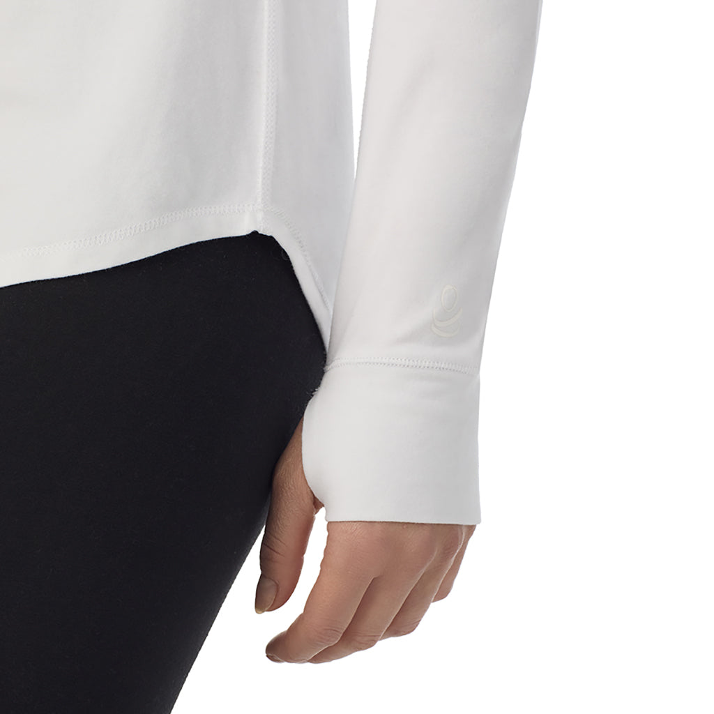 A lady wearing White Cottonwear Long Sleeve Turtleneck