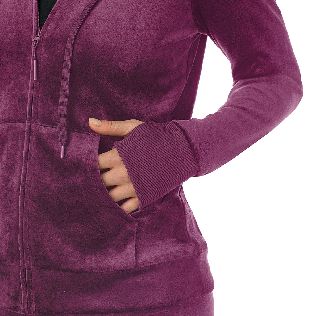 Purple Beet; Model is wearing a size S. She is 5’9”, Bust 34”, Waist 25”, Hips 36”@ A Lady wearing Purple Beet Stretch Velour Full Zip Hoodie