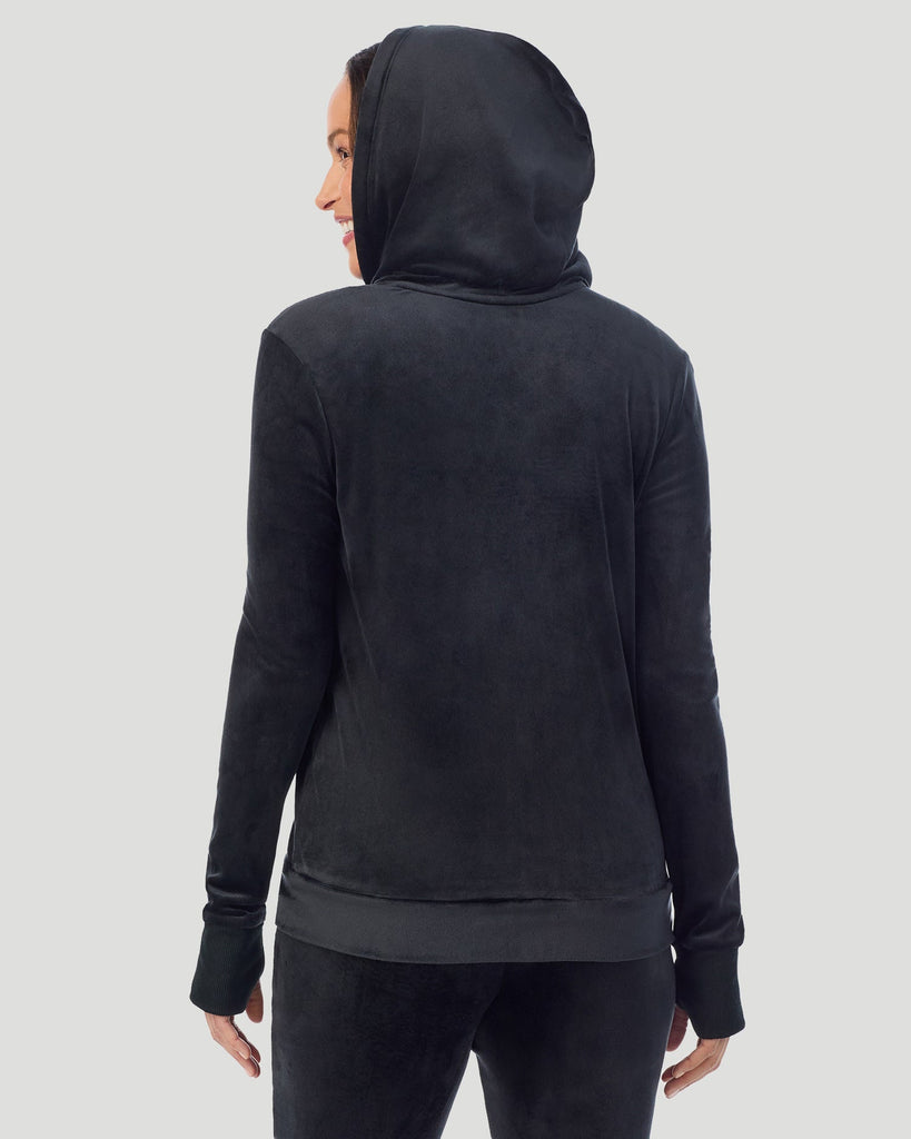 A lady wearing Stretch Velour Full Zip Hoodie in black shown in a back view pose
