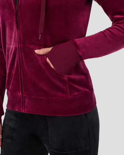 A lady wearing Stretch Velour Full Zip Hoodie in Bordeaux