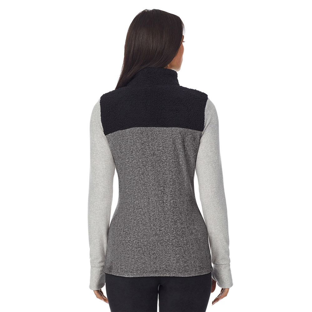 upper body of a lady wearing Charcoal Heather long sleeve mixed media mock !59% Polyester, 35% Recycled Polyester, 6% Spandex!