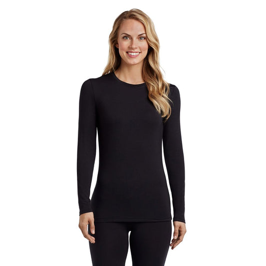 A lady wearing a black long sleeve stretch crew. 
