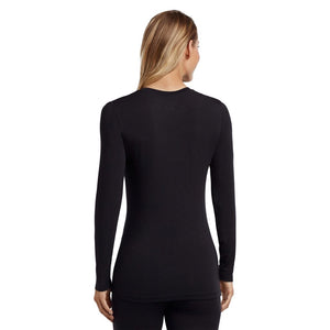 A lady wearing a black long sleeve stretch crew. 