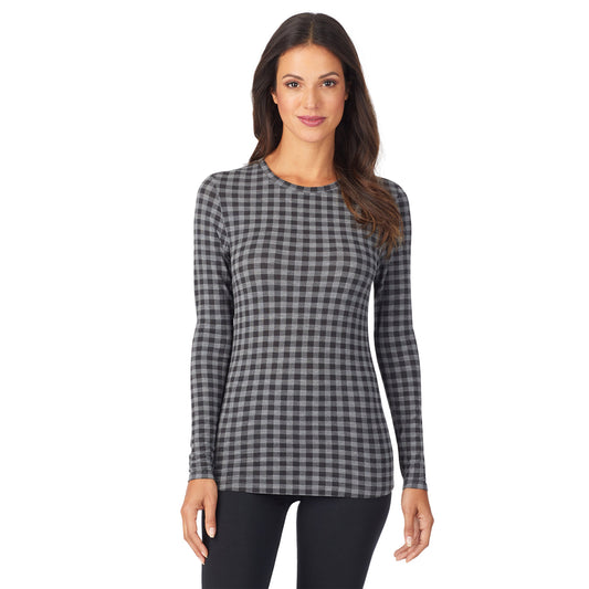 A lady wearing a tonal buffalo long sleeve stretch crew.